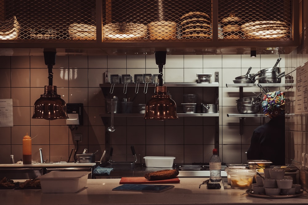 a kitchen filled with lots of pots and pans