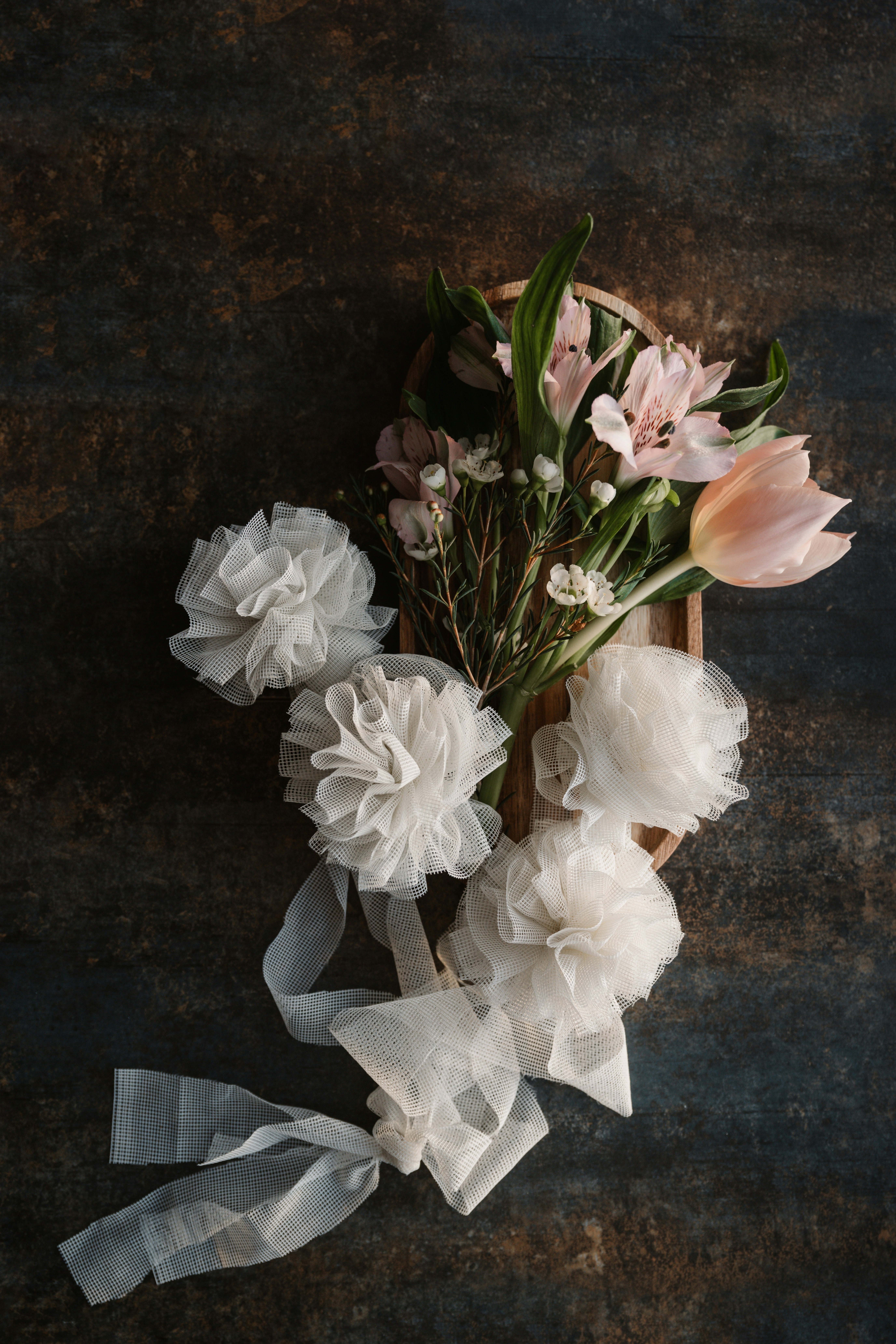 a bunch of flowers sitting on top of a table