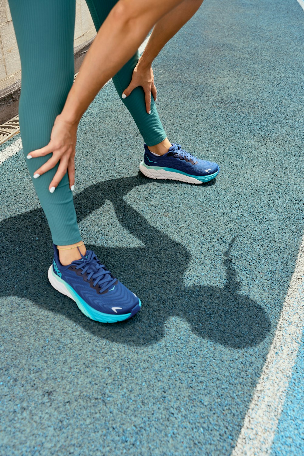 a close up of a person tying their shoes