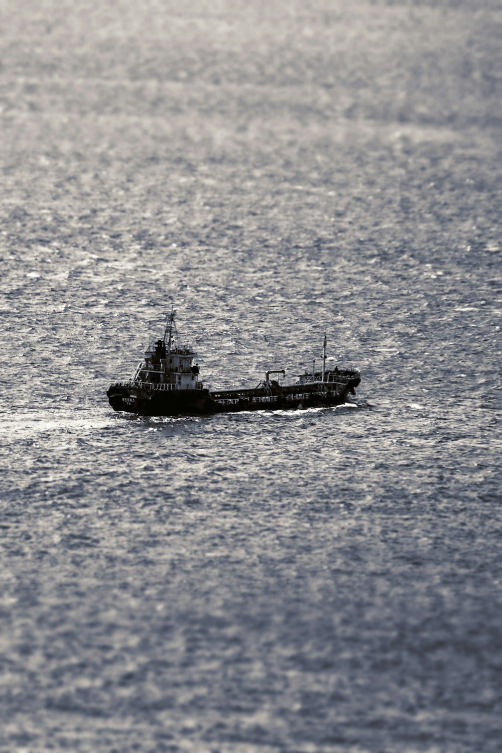 a small boat in a large body of water