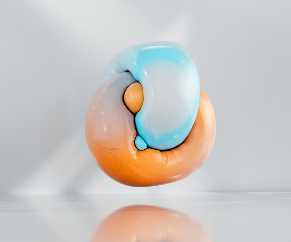 a blue and orange object sitting on top of a table