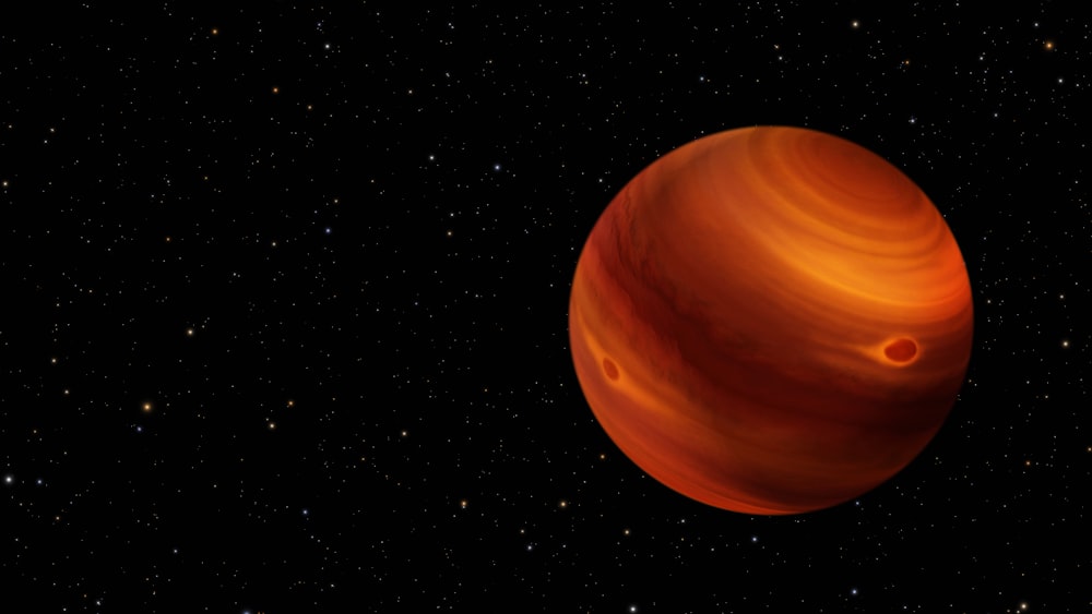 Un planeta rojo con un fondo negro