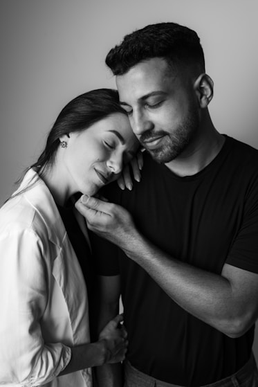 a black and white photo of a man and a woman