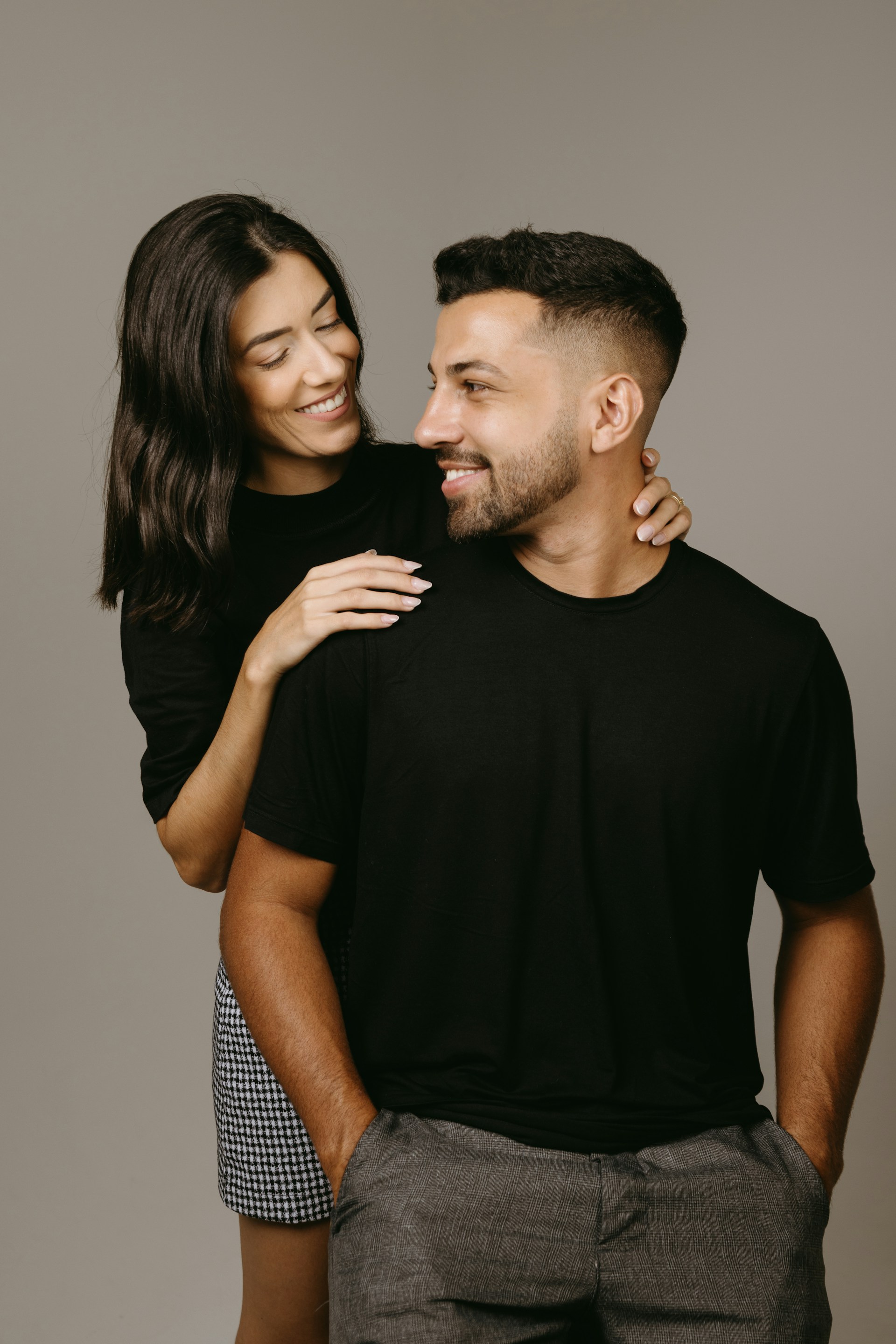a man and a woman are smiling together