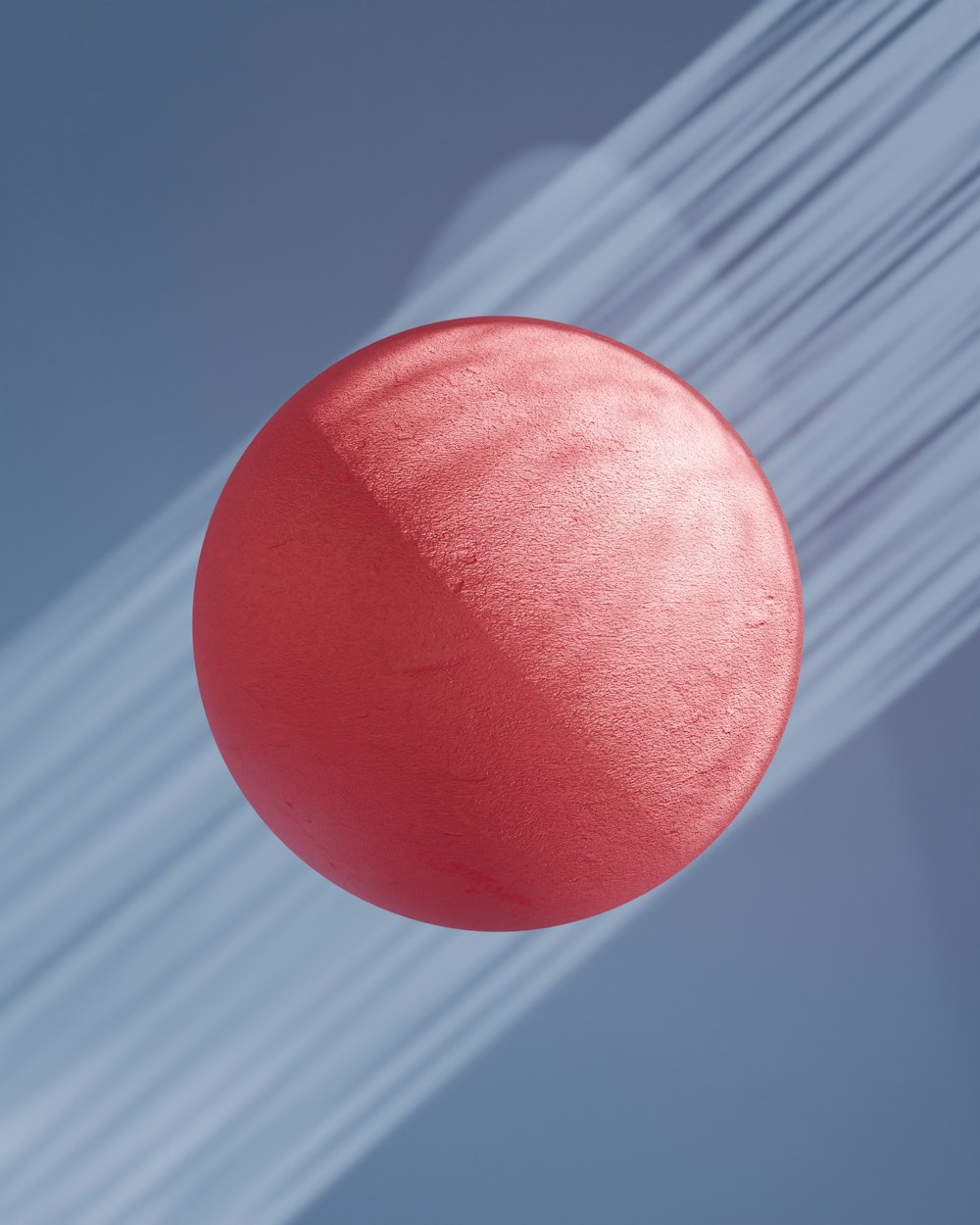 a red object is flying in the air