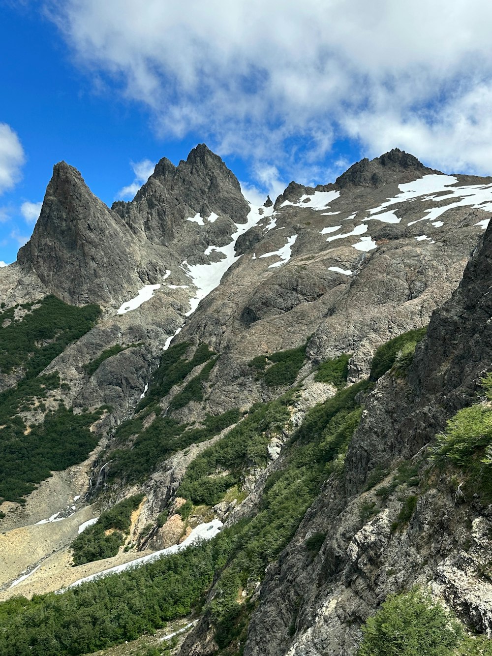 a view of a mountain with snow on it