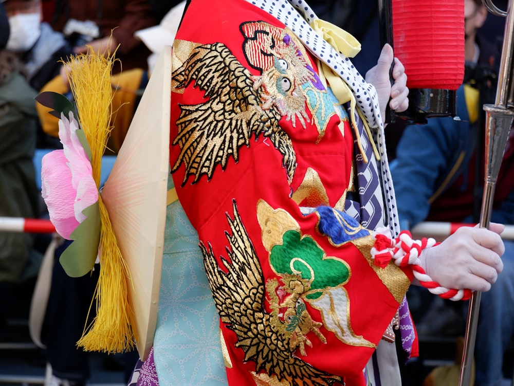 a man dressed in a traditional chinese costume