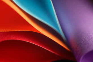 a close up of a multicolored sheet of paper