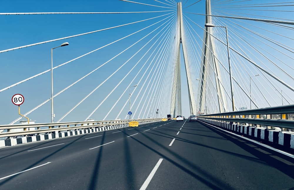 a view of a bridge from the inside of the car