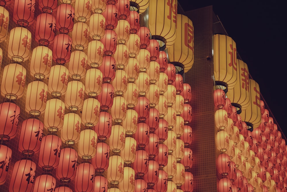 a large number of red and yellow lanterns