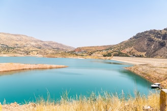 a large body of water surrounded by mountains