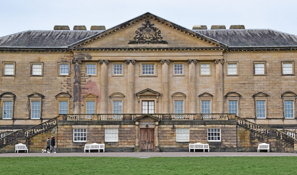 a large building with a lot of windows and stairs