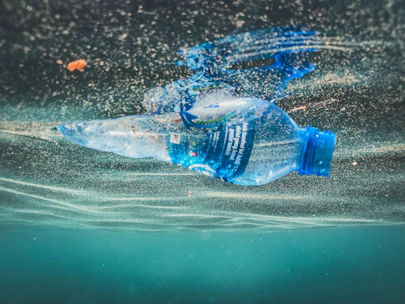 a plastic bottle floating in the water