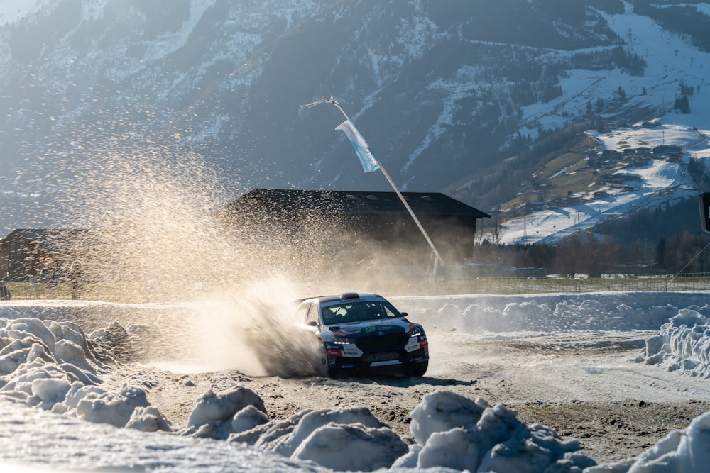 a car driving on a snow covered road