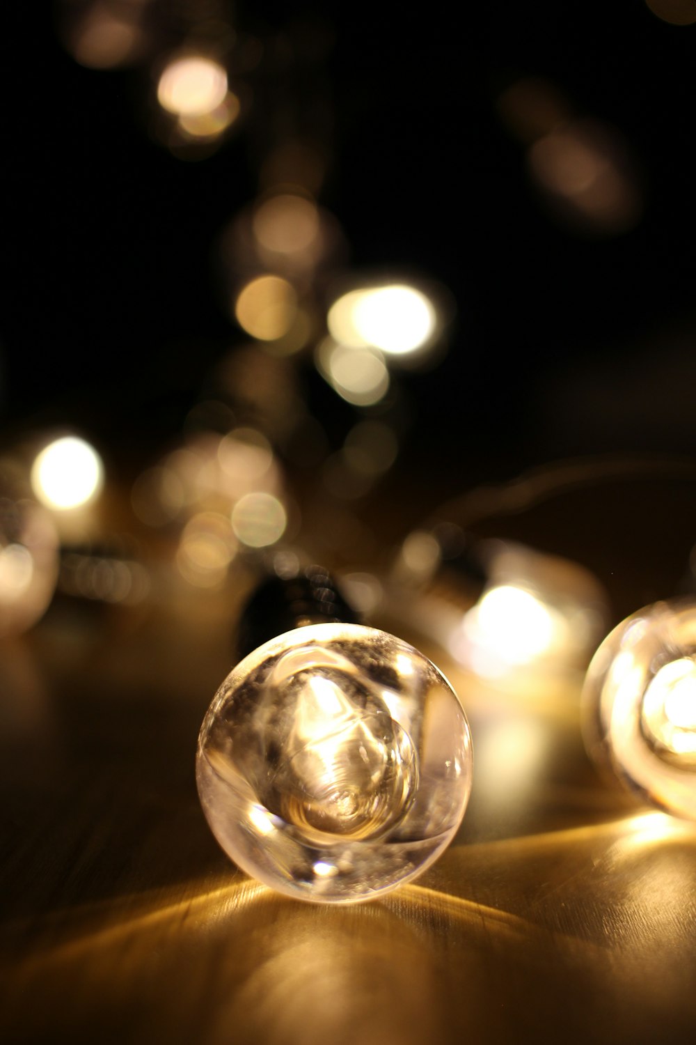 a close up of a light bulb on a table