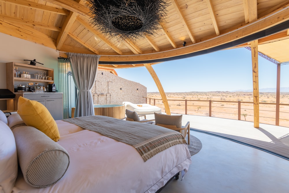 a bedroom with a view of the desert
