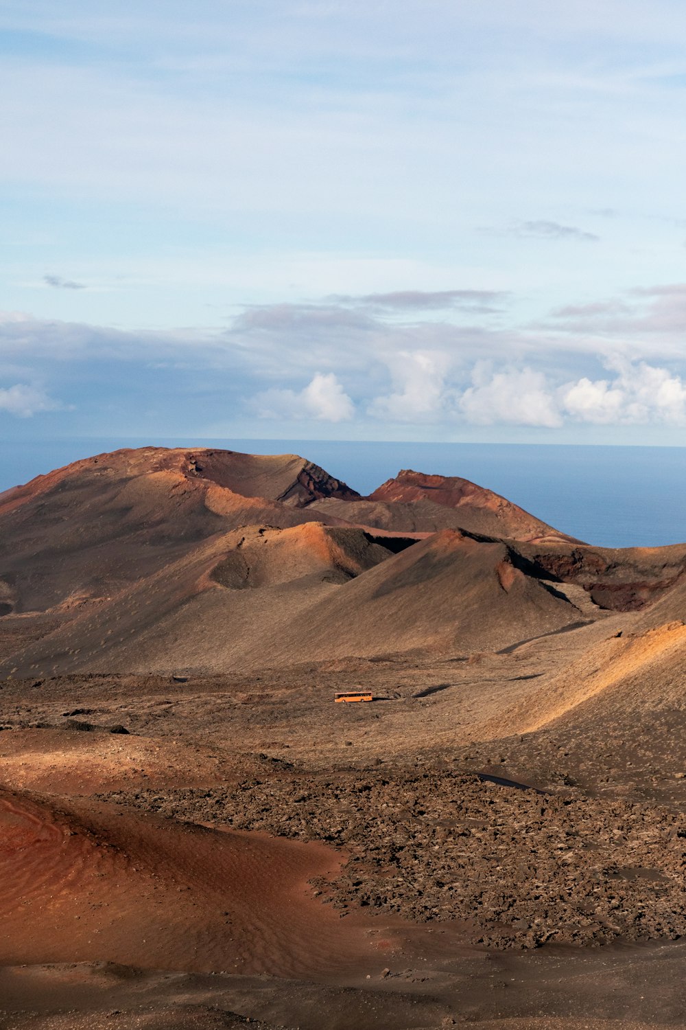 a group of hills in the middle of a desert