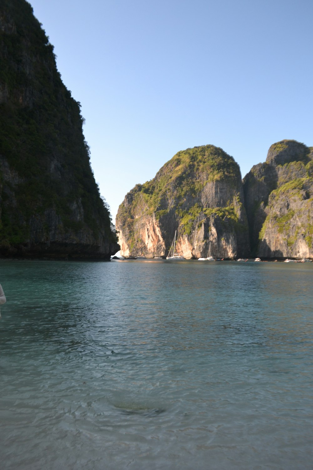 a body of water that has some rocks in it