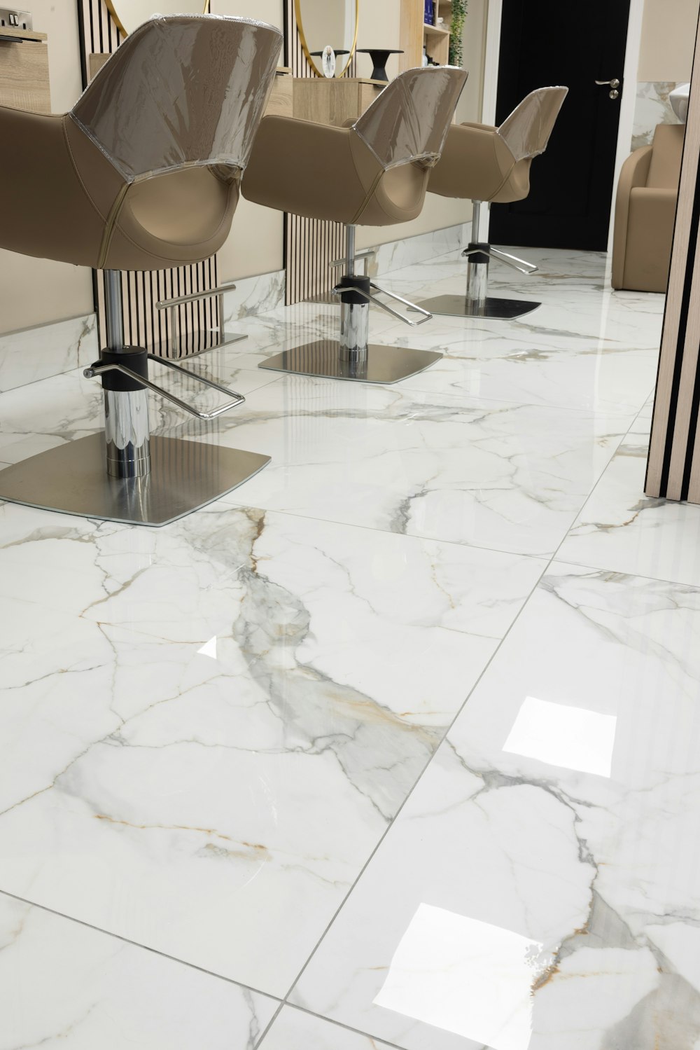 a white marble floor in a salon