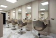 Modern salon interior with styling chairs and mirrors