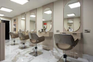 Modern salon interior with styling chairs and mirrors