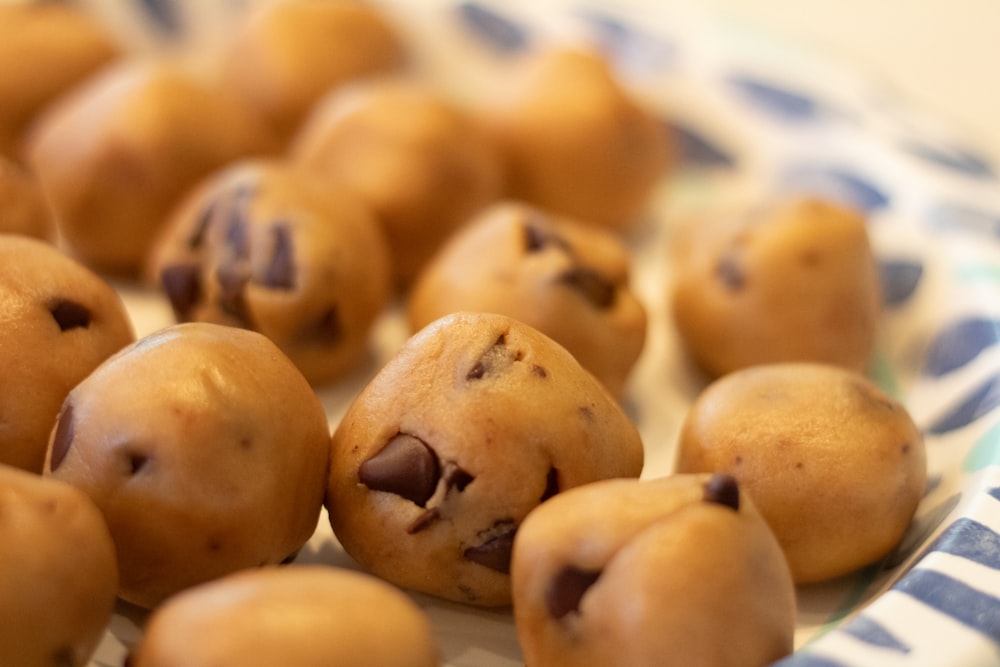 a plate full of chocolate chip cookies on a table