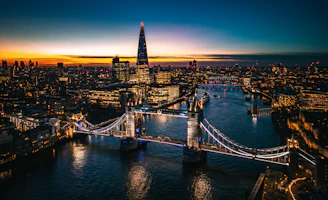 an aerial view of the city of london at night