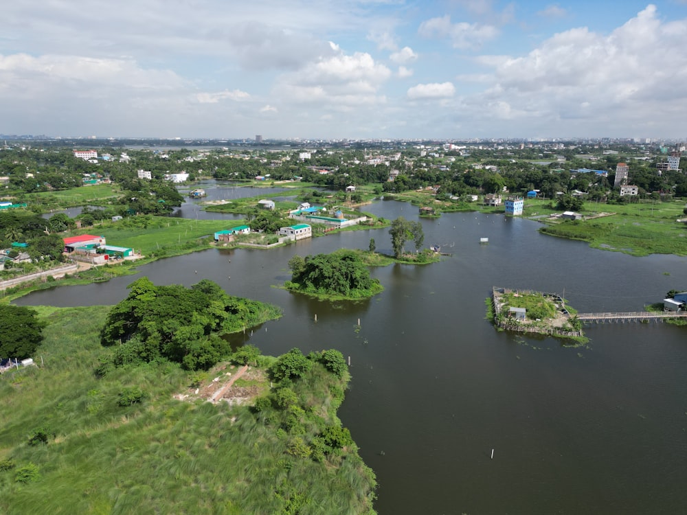 a river running through a lush green countryside