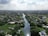 a river running through a lush green countryside