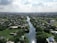 a river running through a lush green countryside