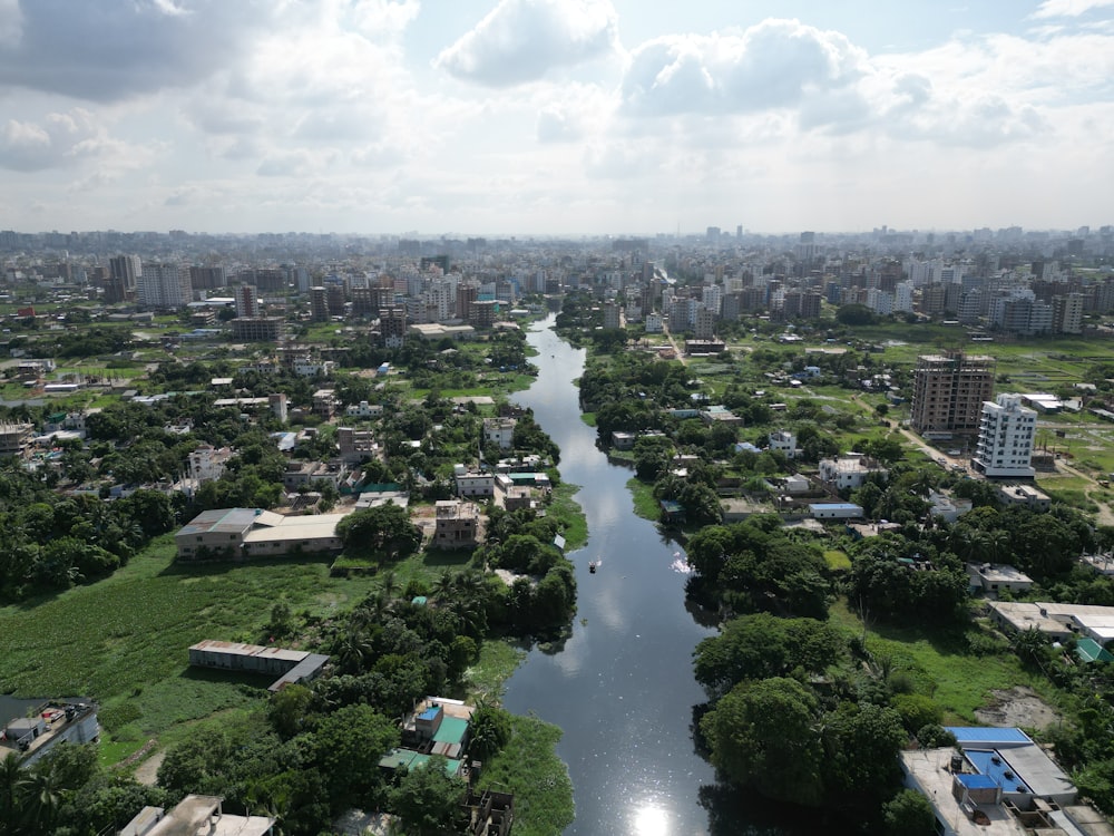 a river running through a lush green countryside