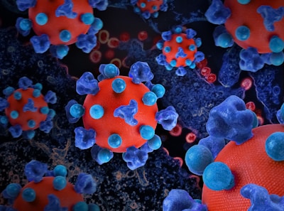 a group of blue and red balls on a black surface