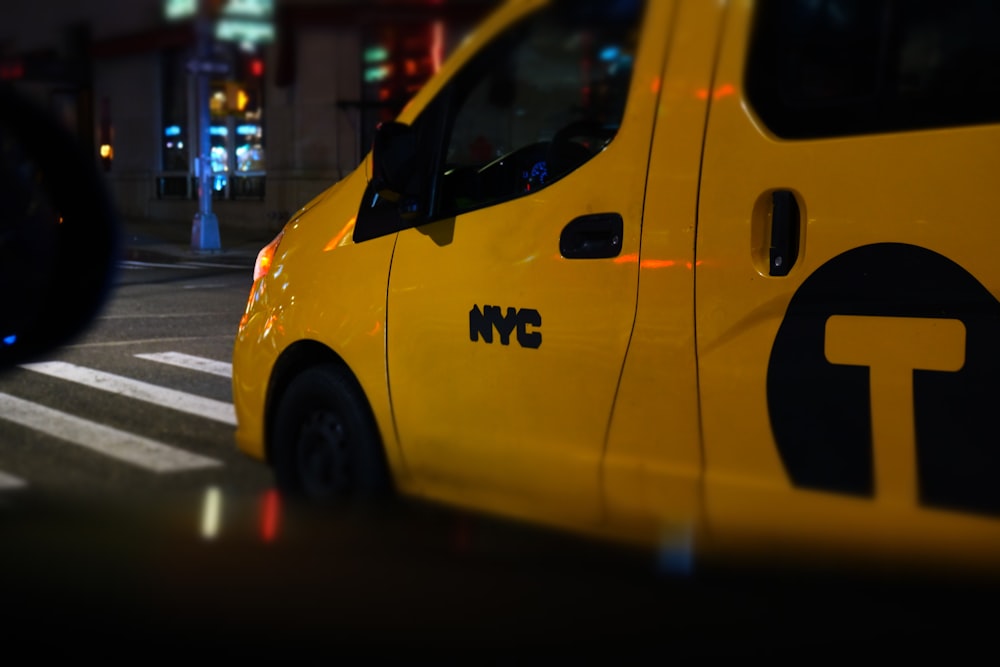 a close up of a taxi cab on a city street