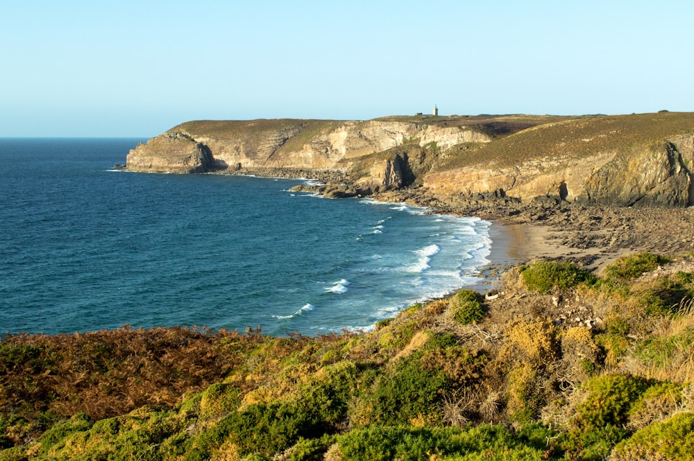 a view of the ocean from a cliff