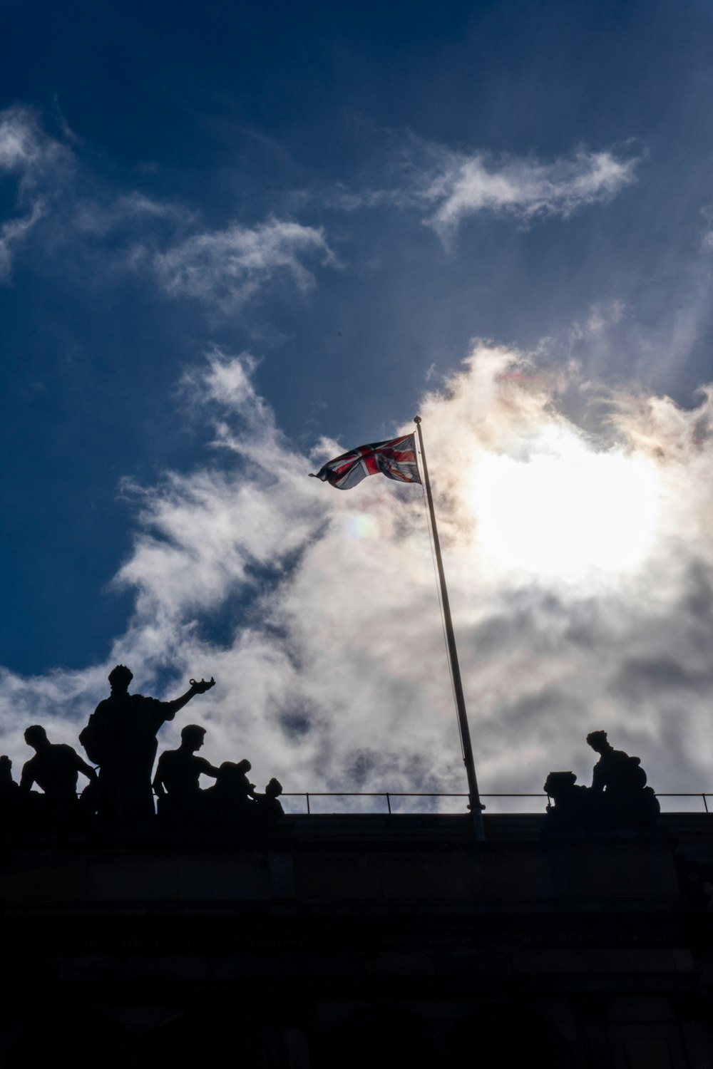 a group of people standing on top of a roof