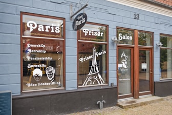a store front with a lot of windows on it