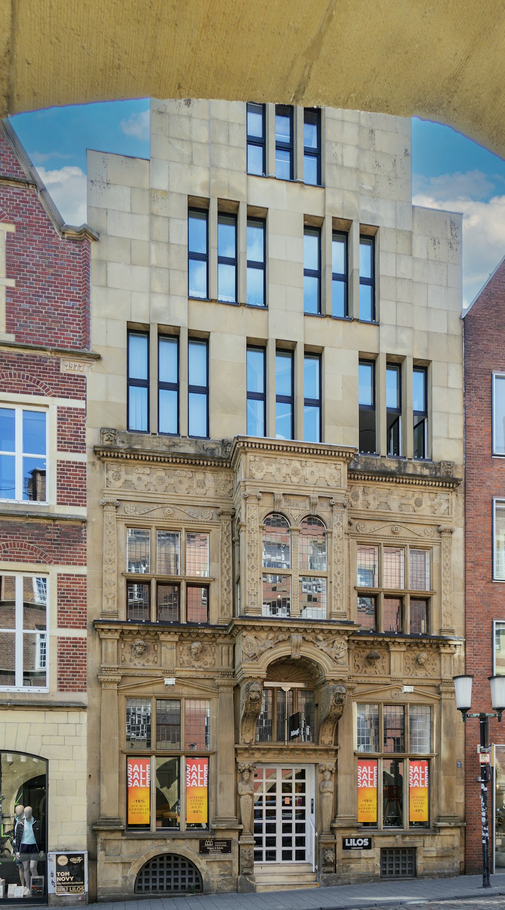 a large building with a clock on the front of it