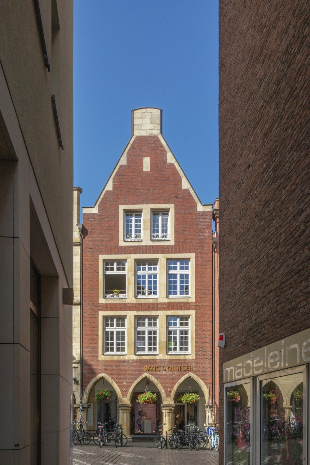 a brick building with a clock tower on top of it