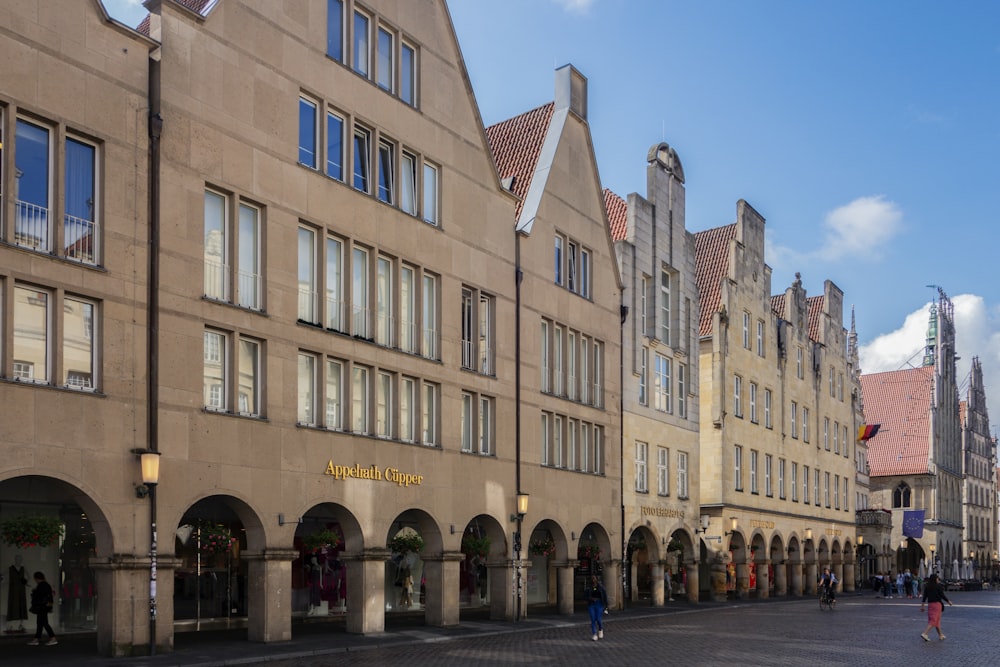 a row of buildings on a city street