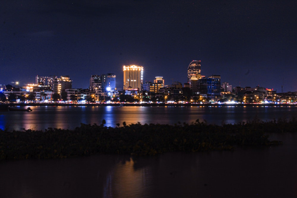 a view of a city at night from across the water