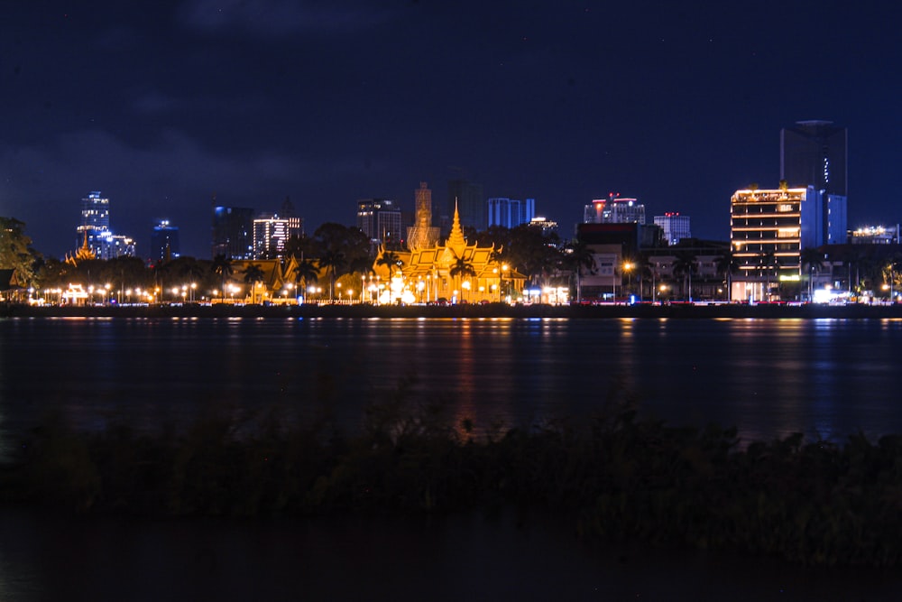 a view of a city at night from across the water