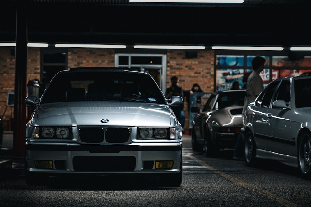 a couple of cars parked next to each other