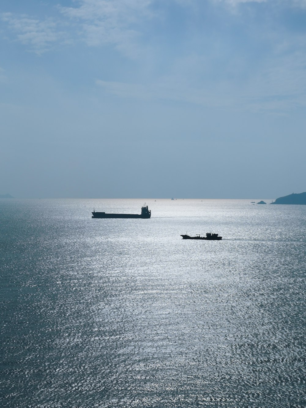 a large boat floating on top of a large body of water