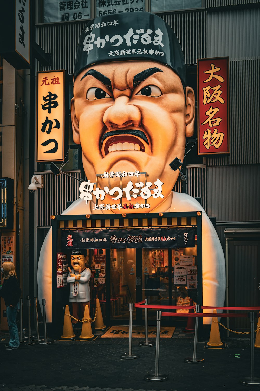 a giant statue of a man with his mouth open