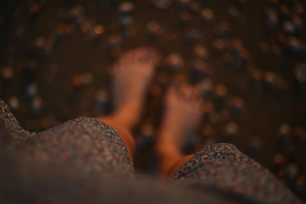 a close up of a person's feet and feet