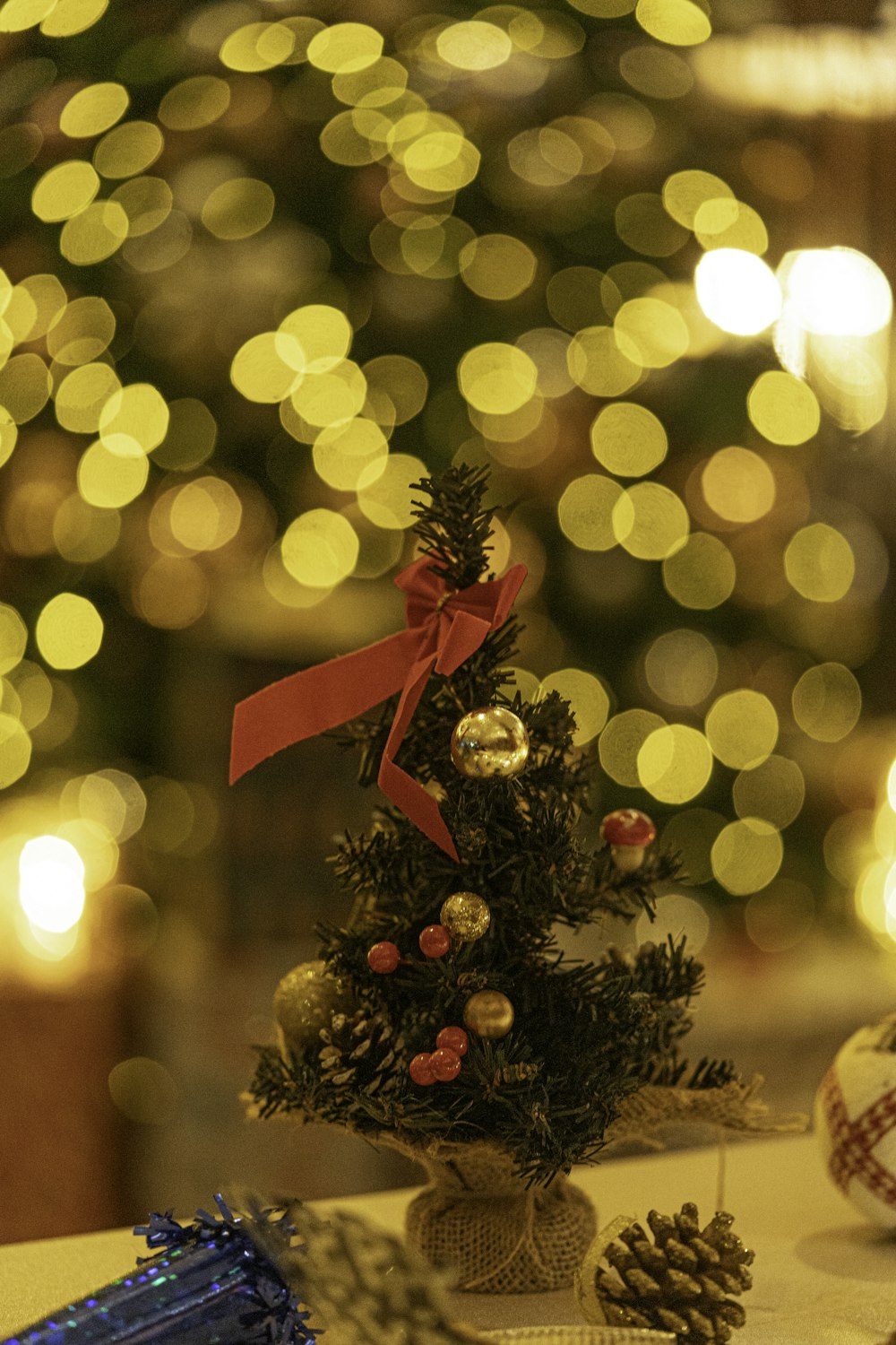 a small christmas tree sitting on top of a table