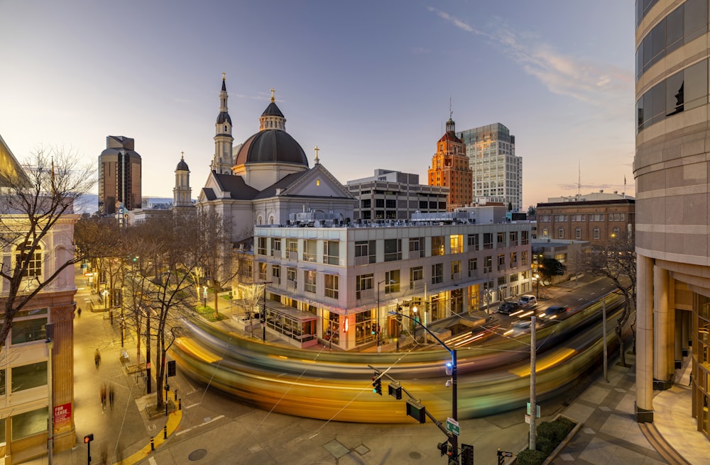 a view of a city street at dusk