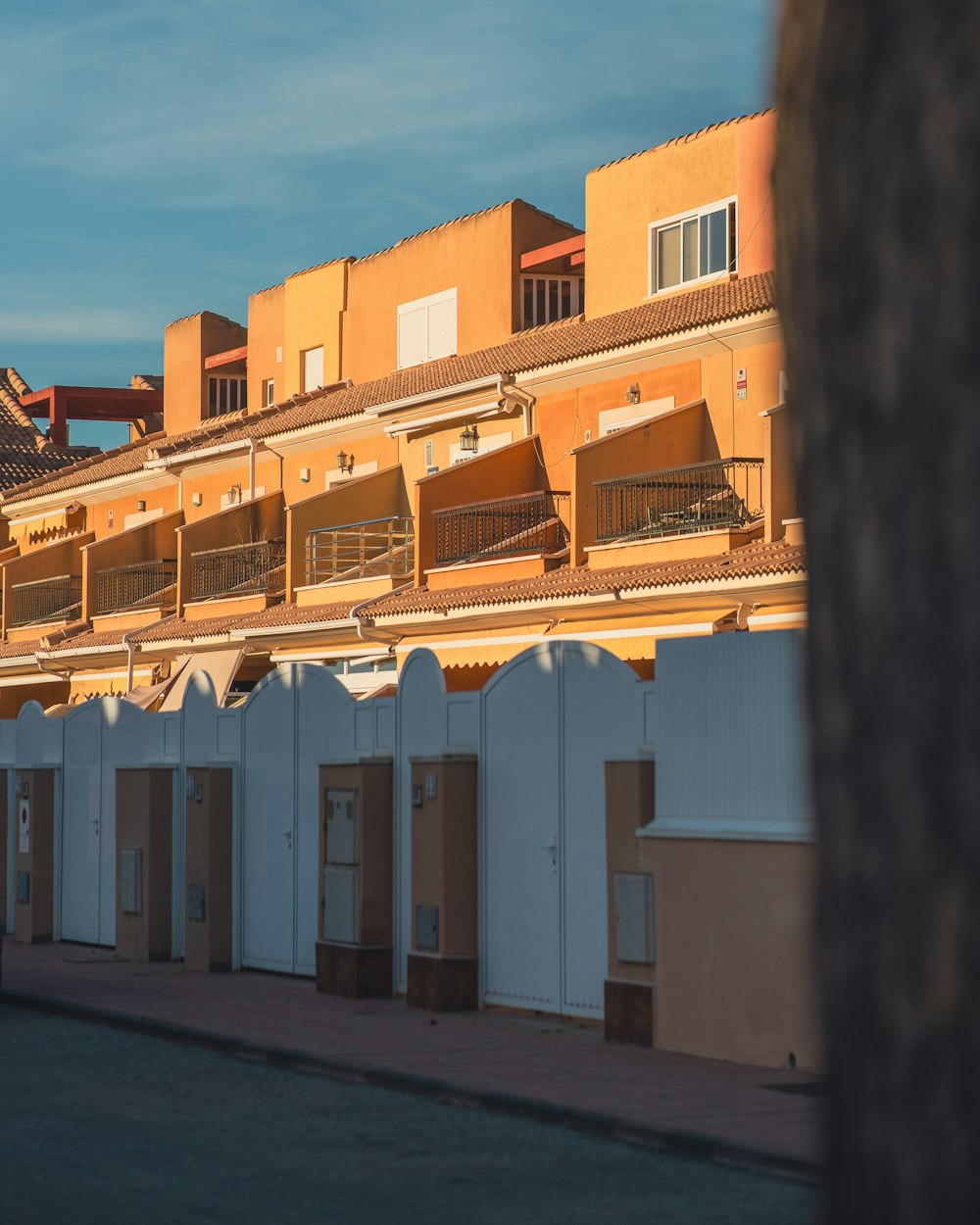 a row of apartment buildings with balconies and balconies