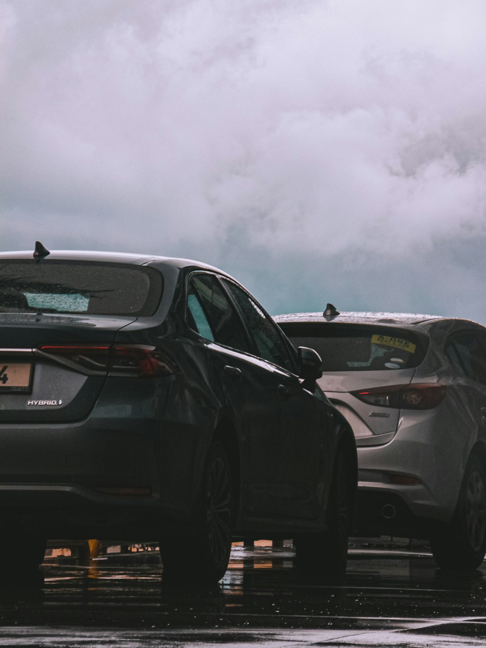 a couple of cars parked next to each other