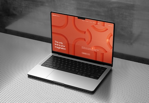 a laptop computer sitting on top of a table